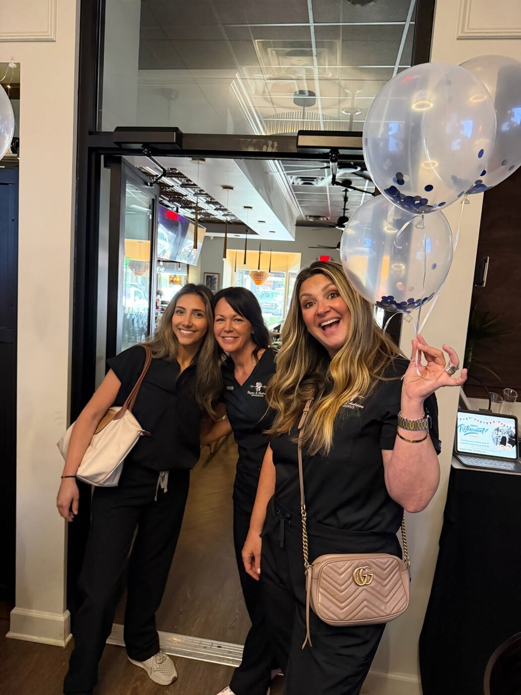 Rogers & Andrews team members celebrating together