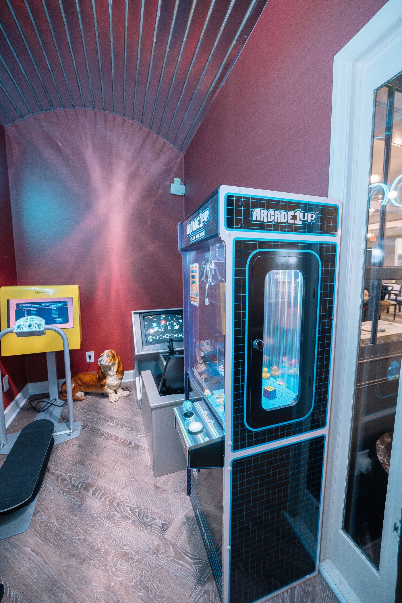 The claw machine in the Rogers & Andrews game room